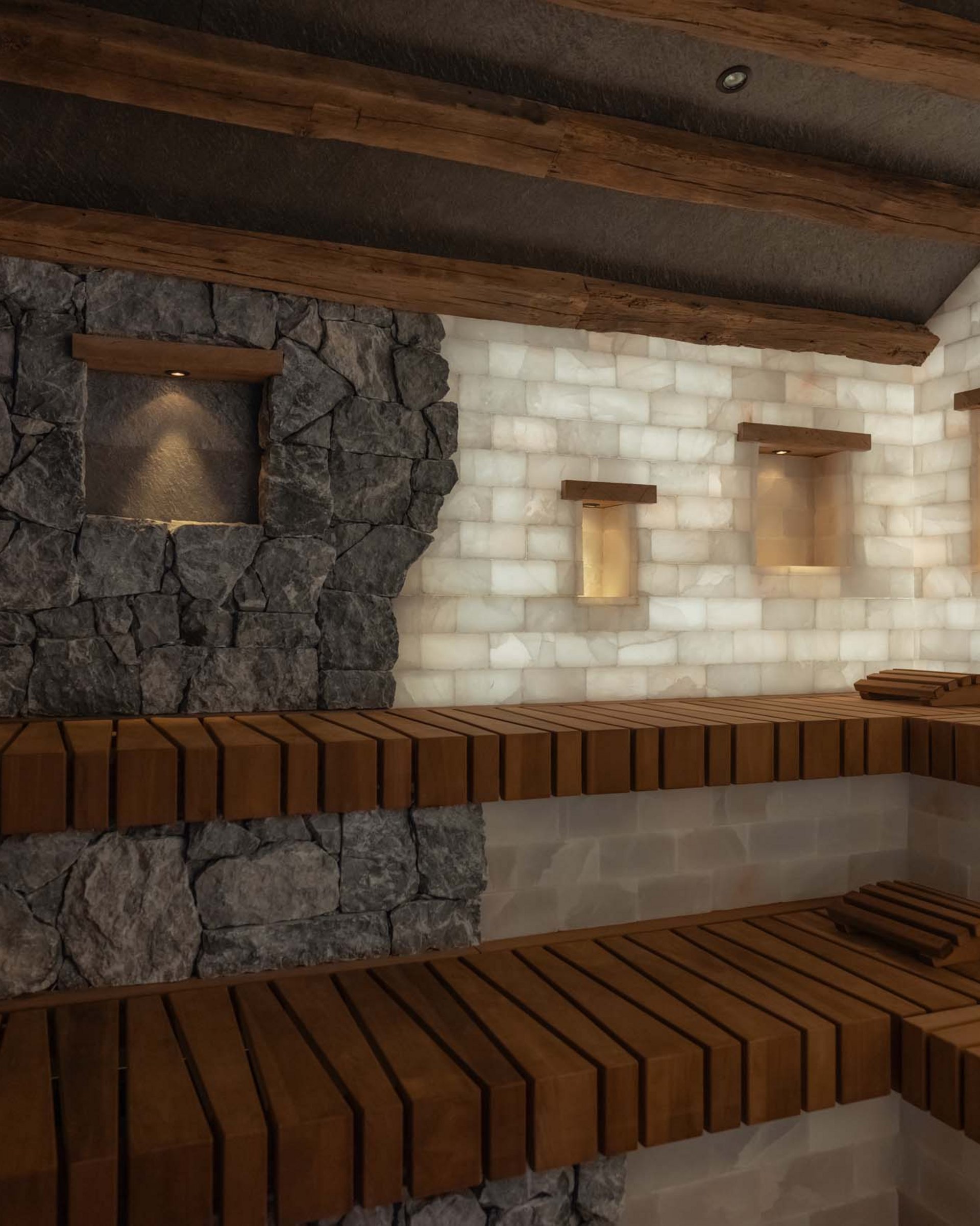 Innenraum einer Sauna mit Holzbänken und beleuchteten Steinwänden